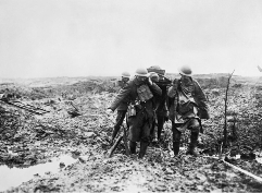Widecombe WW1: Stretcher bearers on Passchendaele battlefield IWM Photo from CANADIAN FIRST WORLD WAR OFFICIAL EXCHANGE COLLECTION